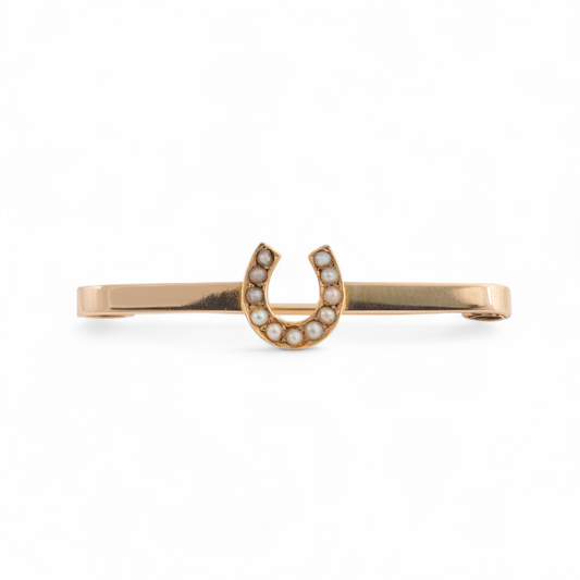 Edwardian 15ct gold lucky horseshoe brooch with seed pearls, front view