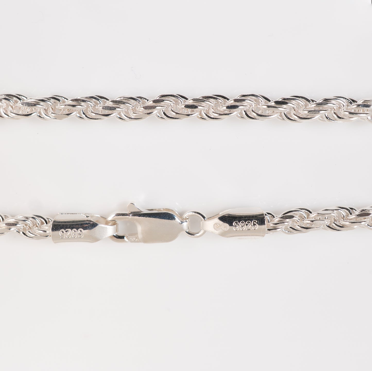 Close-up of sterling silver rope bracelet clasp and end caps