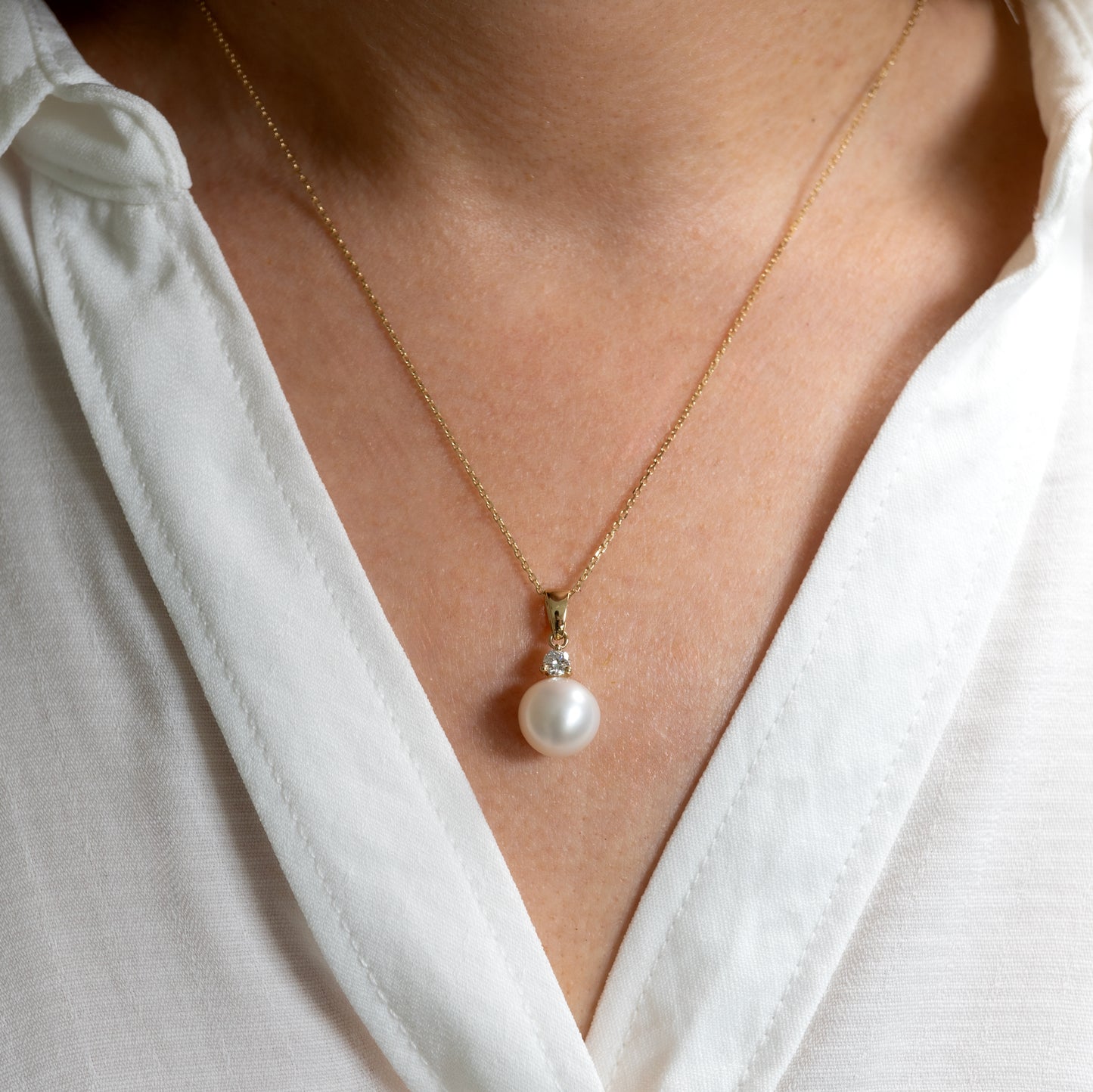 9ct gold pearl necklace shown worn on model