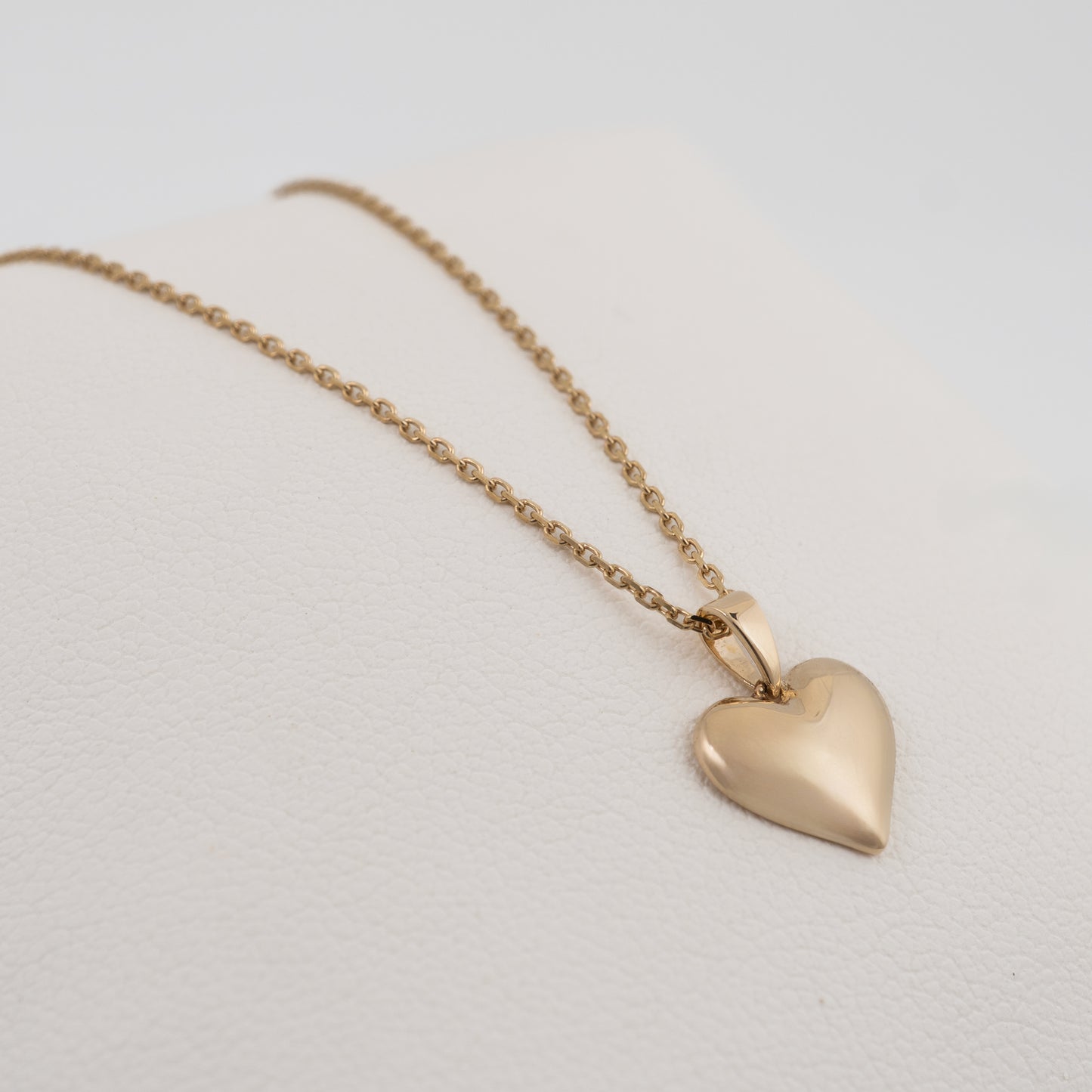 Small gold heart pendant with 16 to 18 inch chain