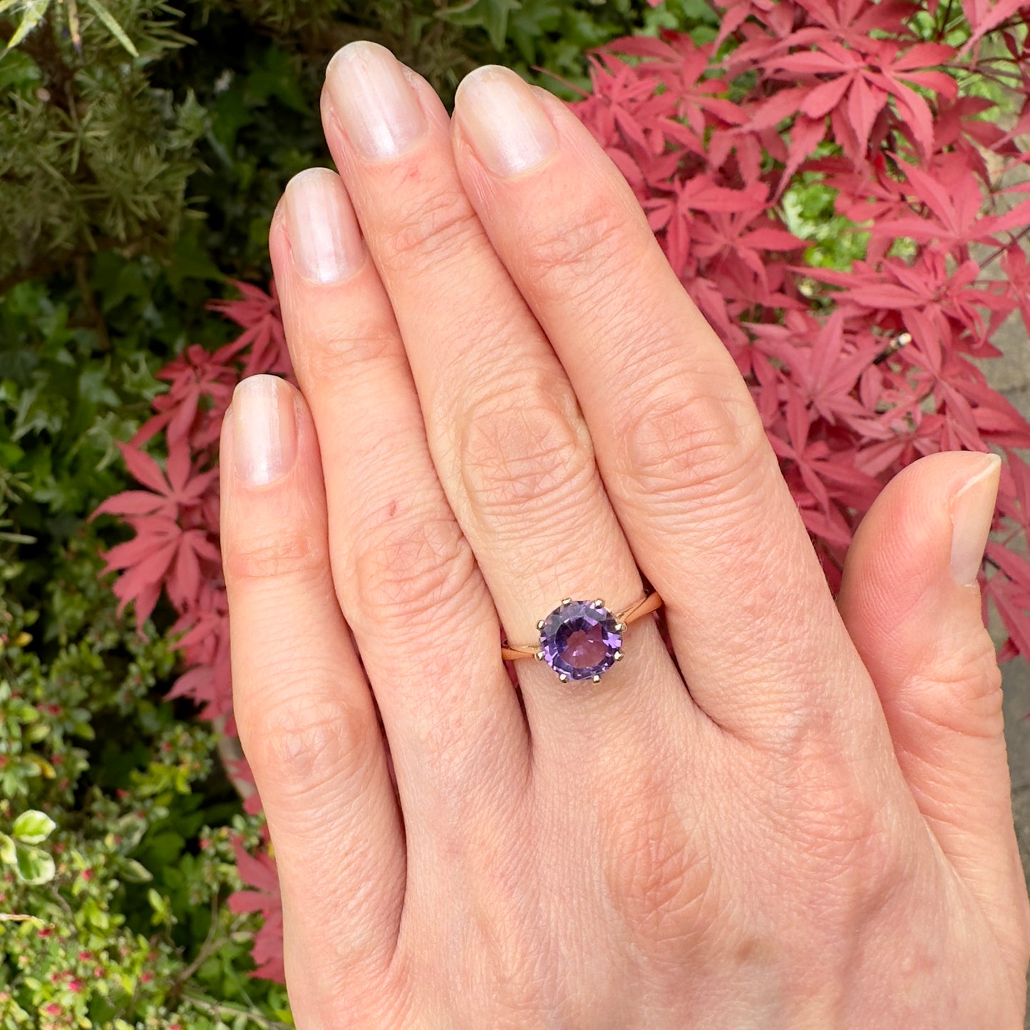 Amethyst-Solitaire-Ring-on-Woman’s-Hand