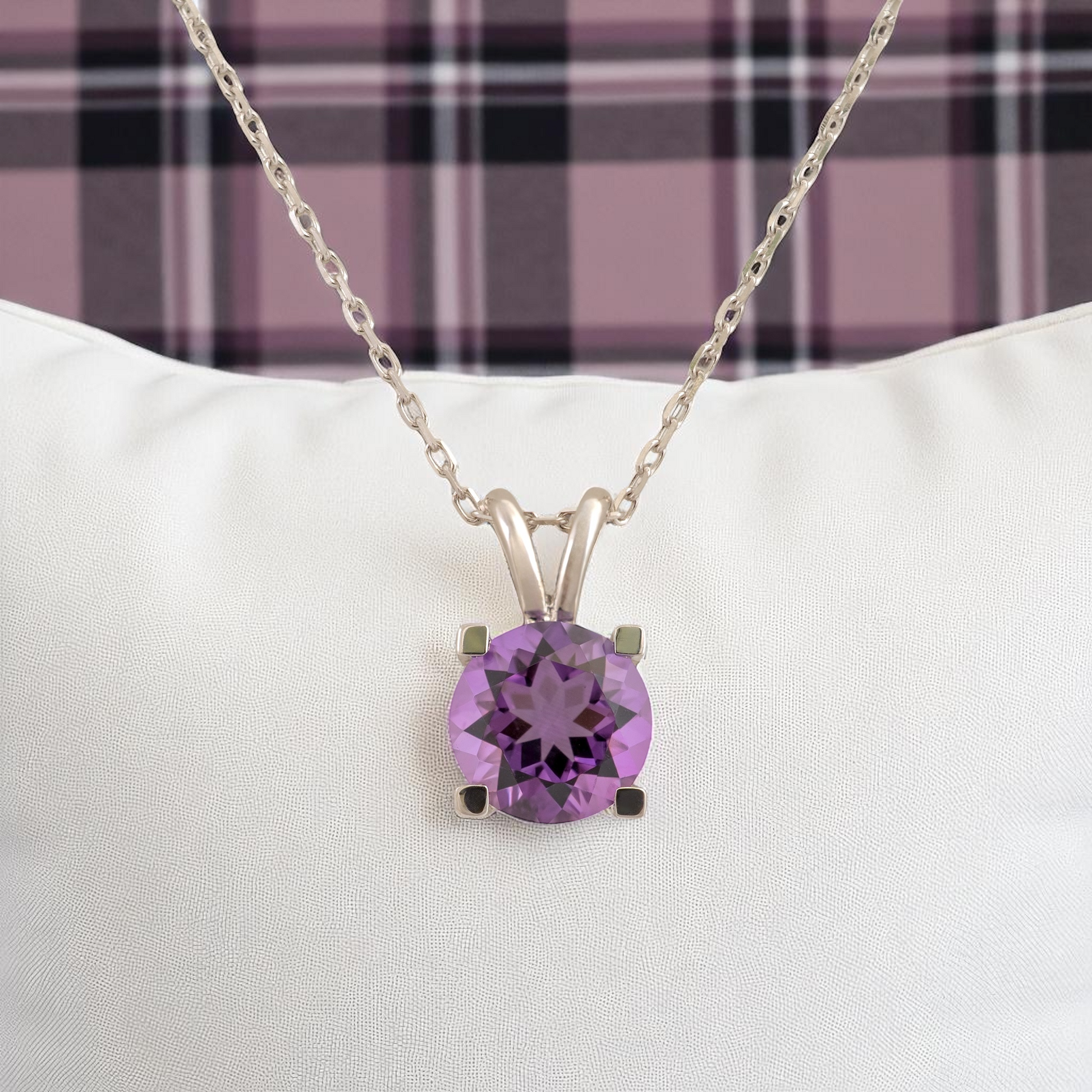 amethyst-pendant-display-cushion-tartan-background