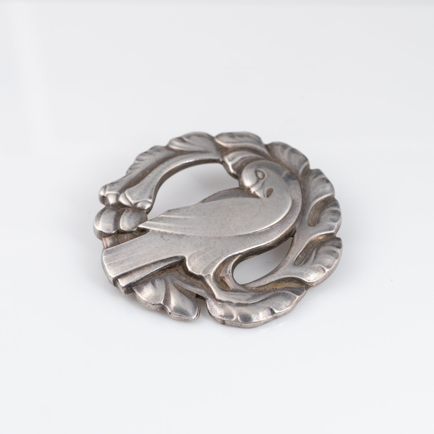 Vintage Georg Jensen Circular Bird Brooch Design 123 by Kristian Mohl-Hansen