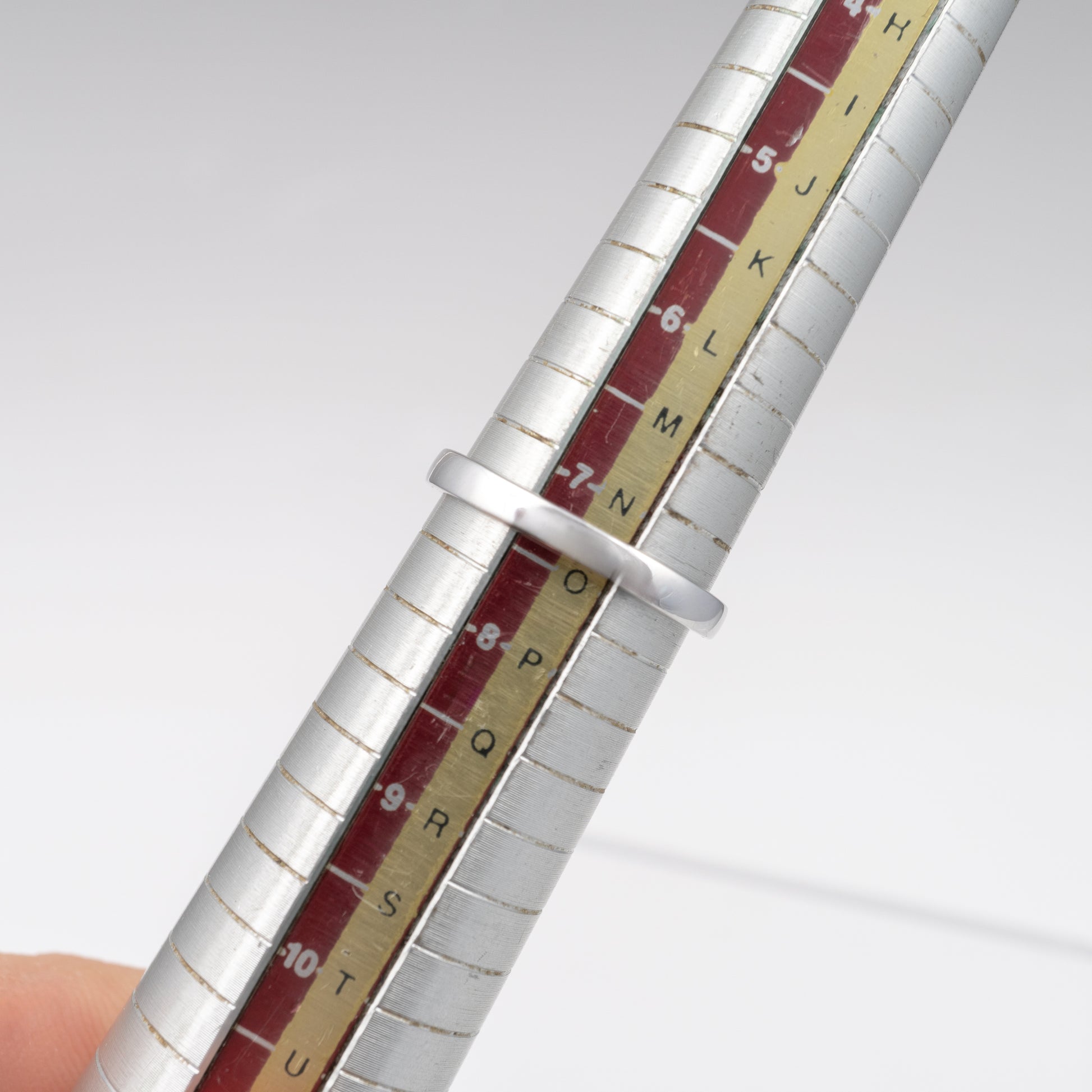 Ruby-Diamond-Halo-Ring-on-UK-Sizer-Stick-Size-N-3/4