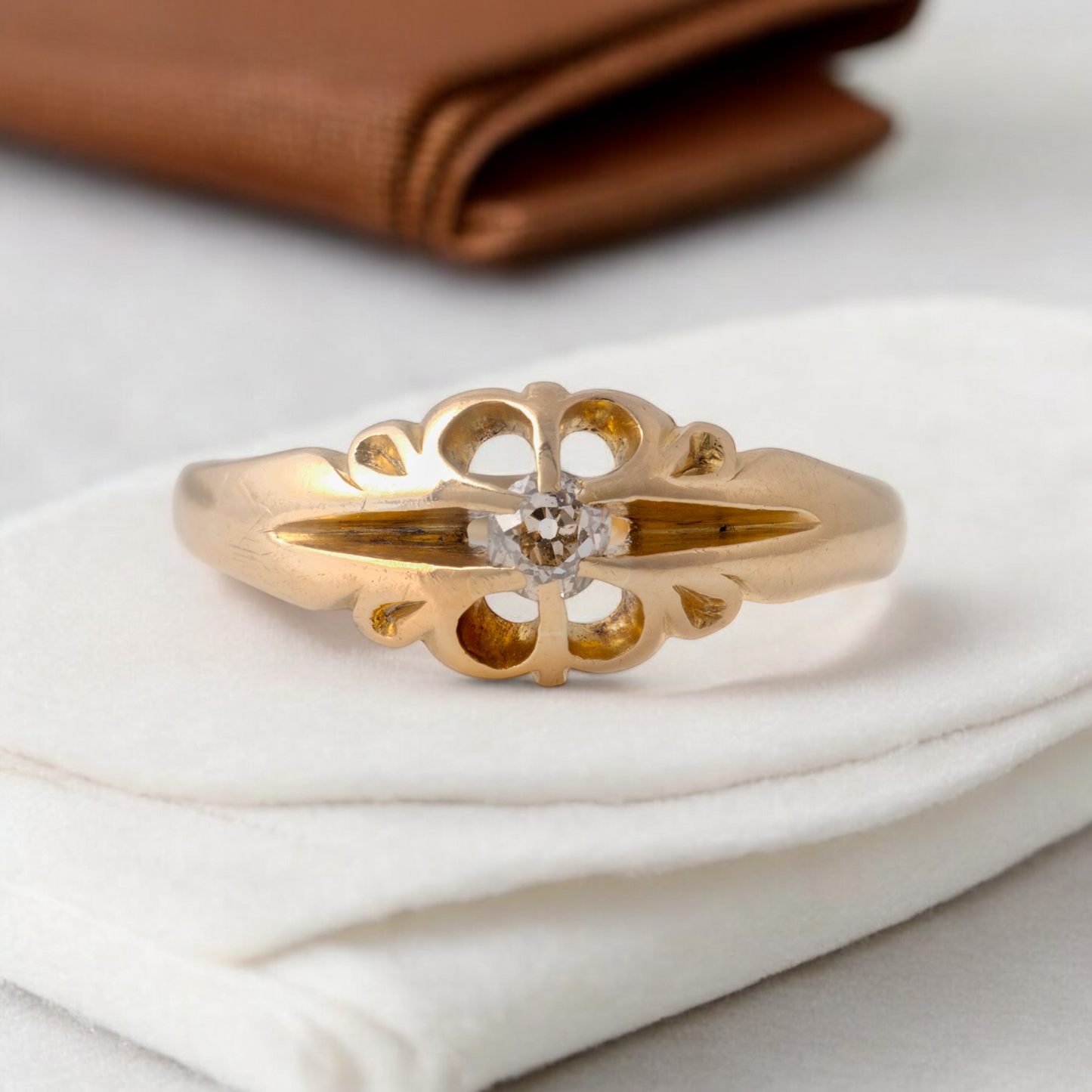 Close-up of mens antique diamond ring in 18ct yellow gold with intricate setting and old-cut diamond by Hunters Fine Jewellery