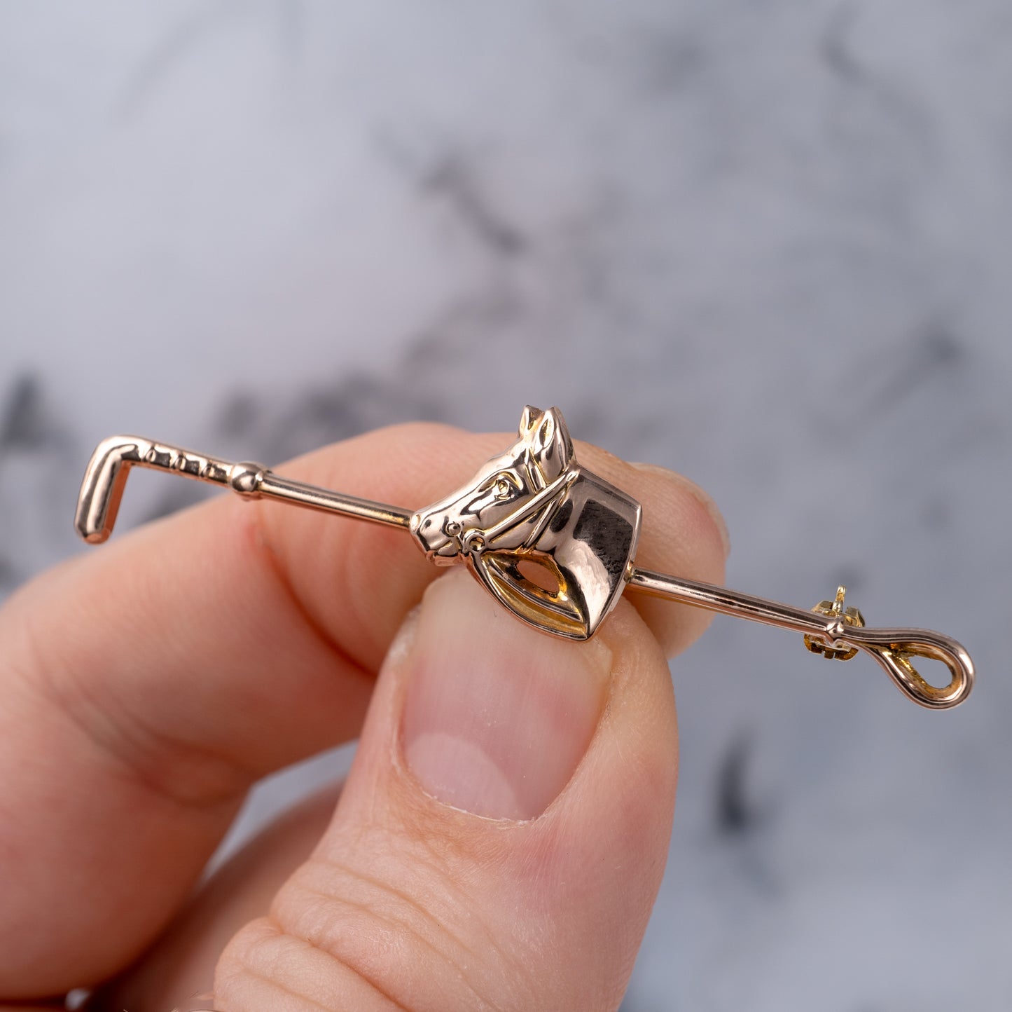 gold horse crop brooch pin