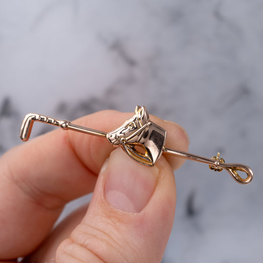 gold horse crop brooch pin