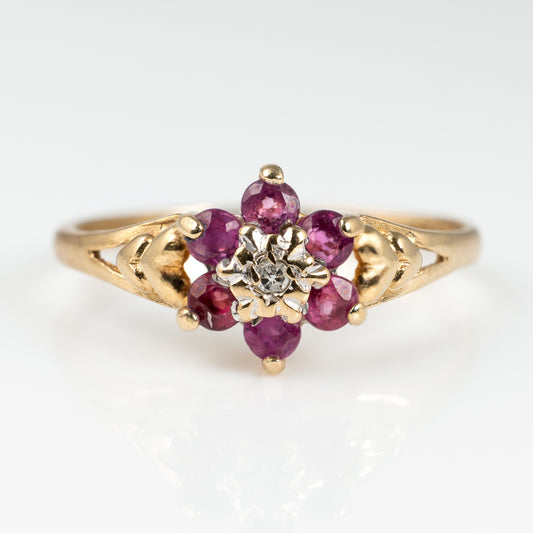 ruby and diamond ring with heart motif shoulders 9ct gold
