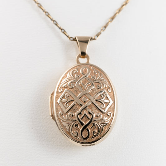 gold photo locket necklace celtic pattern front