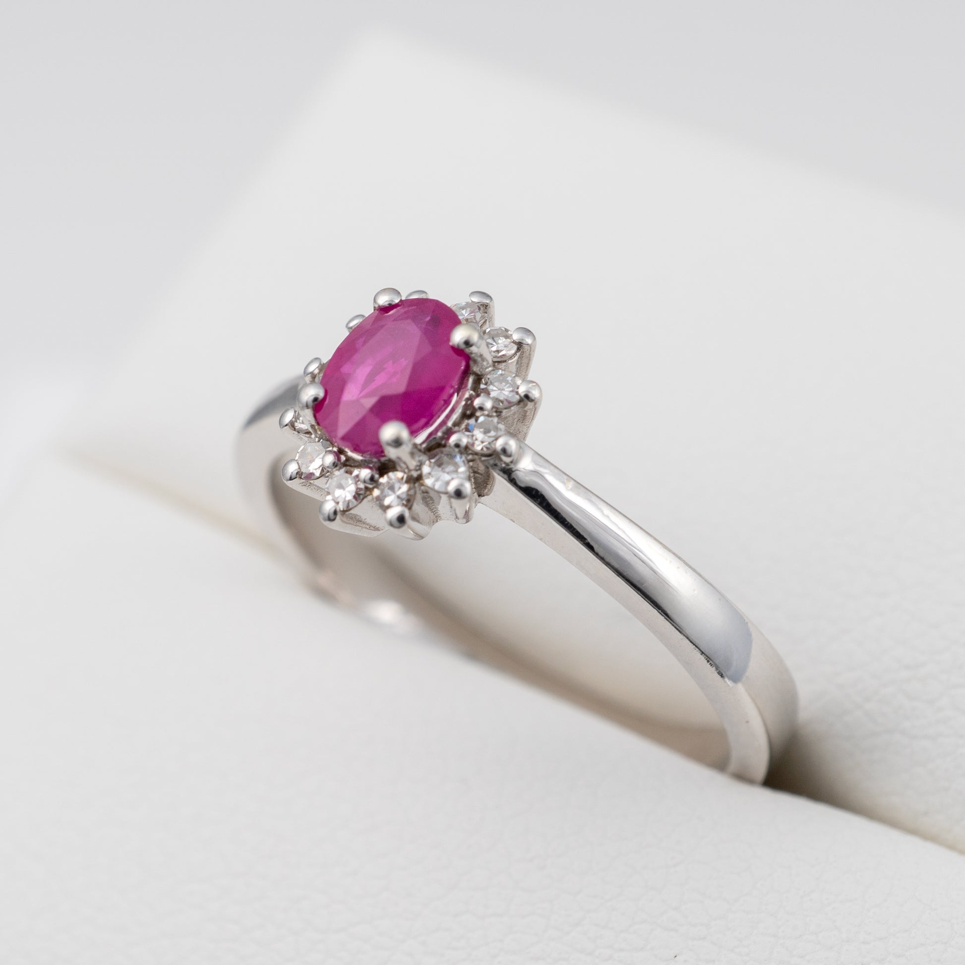 Ruby-Diamond-Halo-Ring-in-White-Gold-Side-Angle