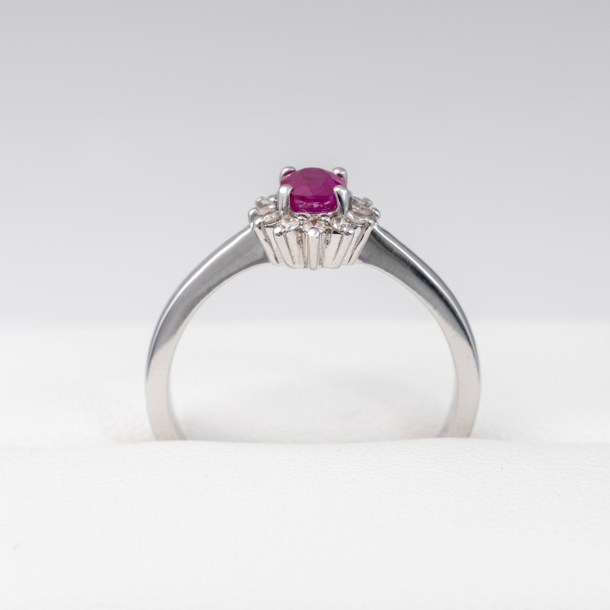 Ruby-Diamond-Halo-Ring-in-White-Gold-Side-Angle
