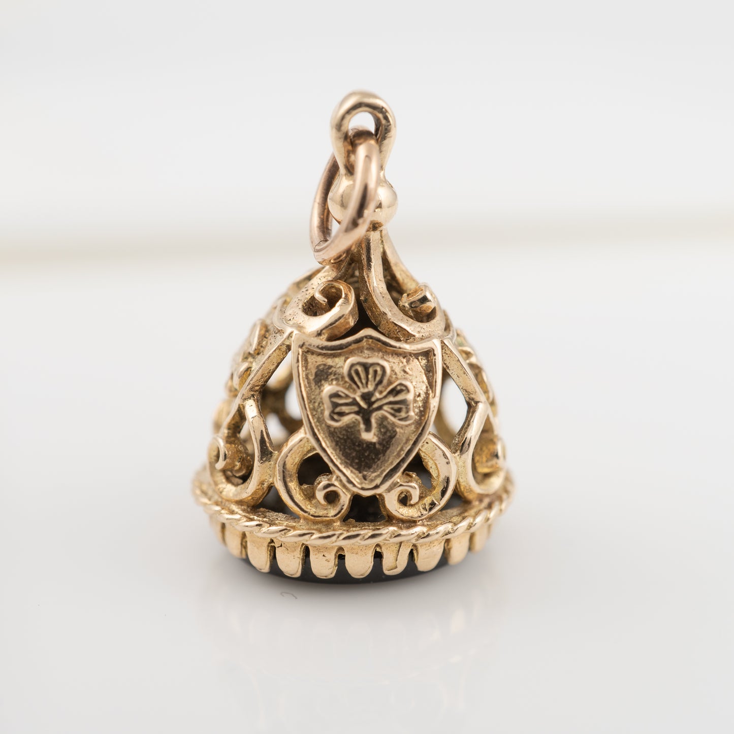Shamrock motif on vintage 9ct gold fob pendant with openwork scrolls