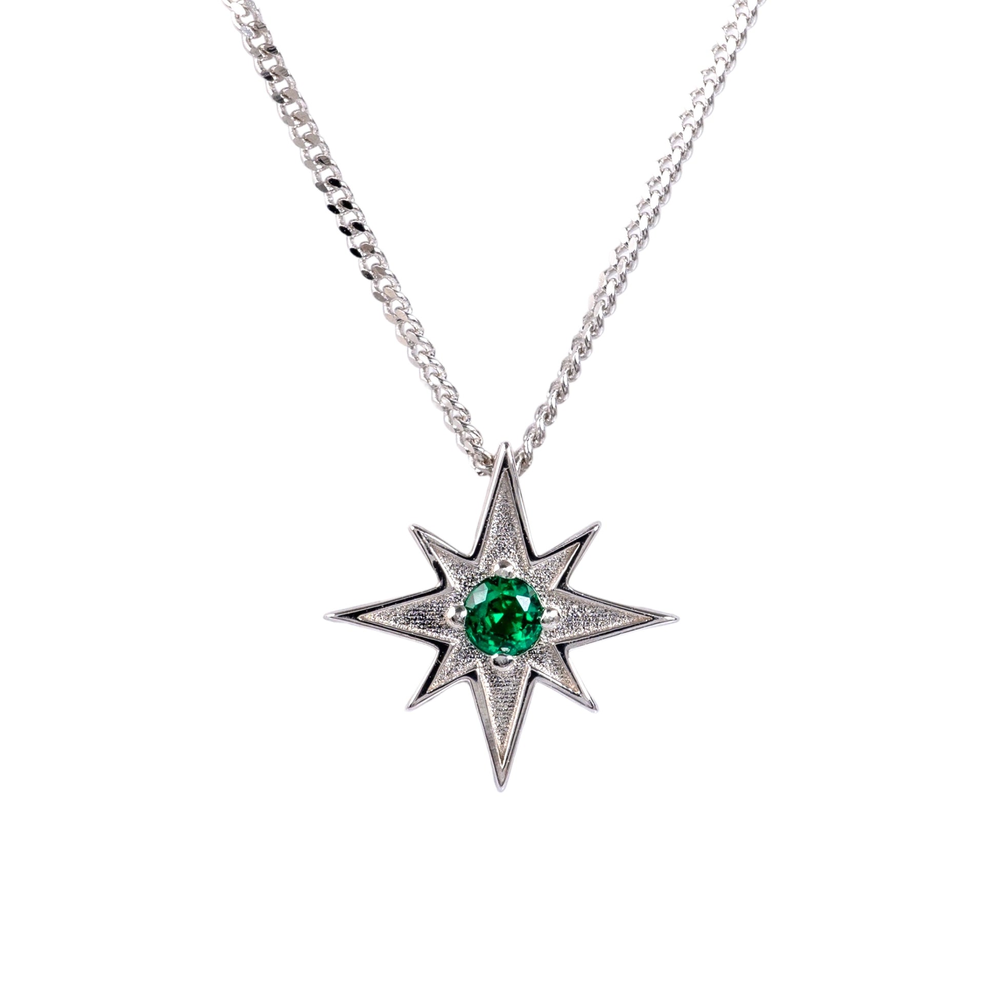 925 silver celestial star necklace with green gemstone on white background
