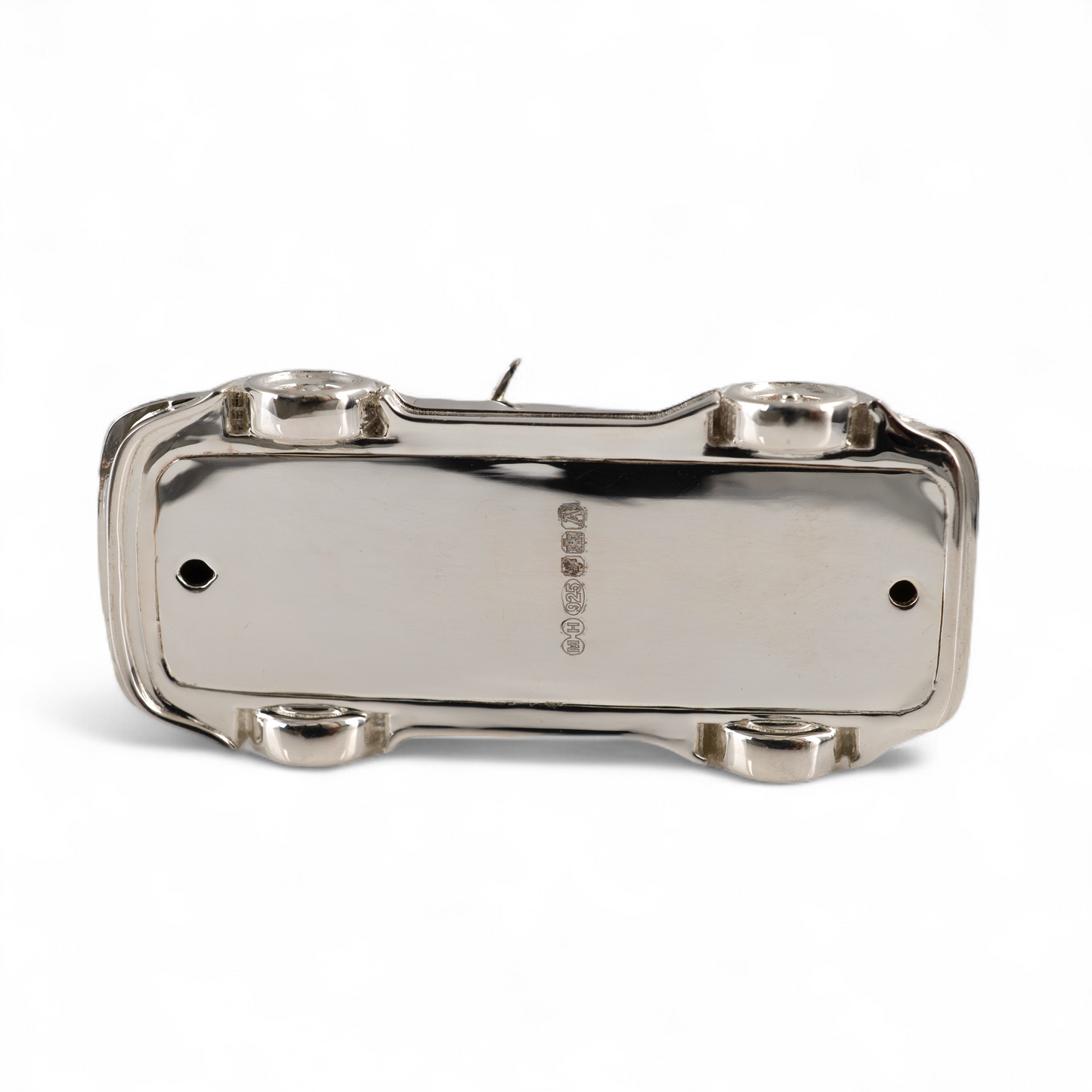 underside view of silver Porsche 911 car ornament handcrafted by Hunters Fine Jewellery with assay hallmarking