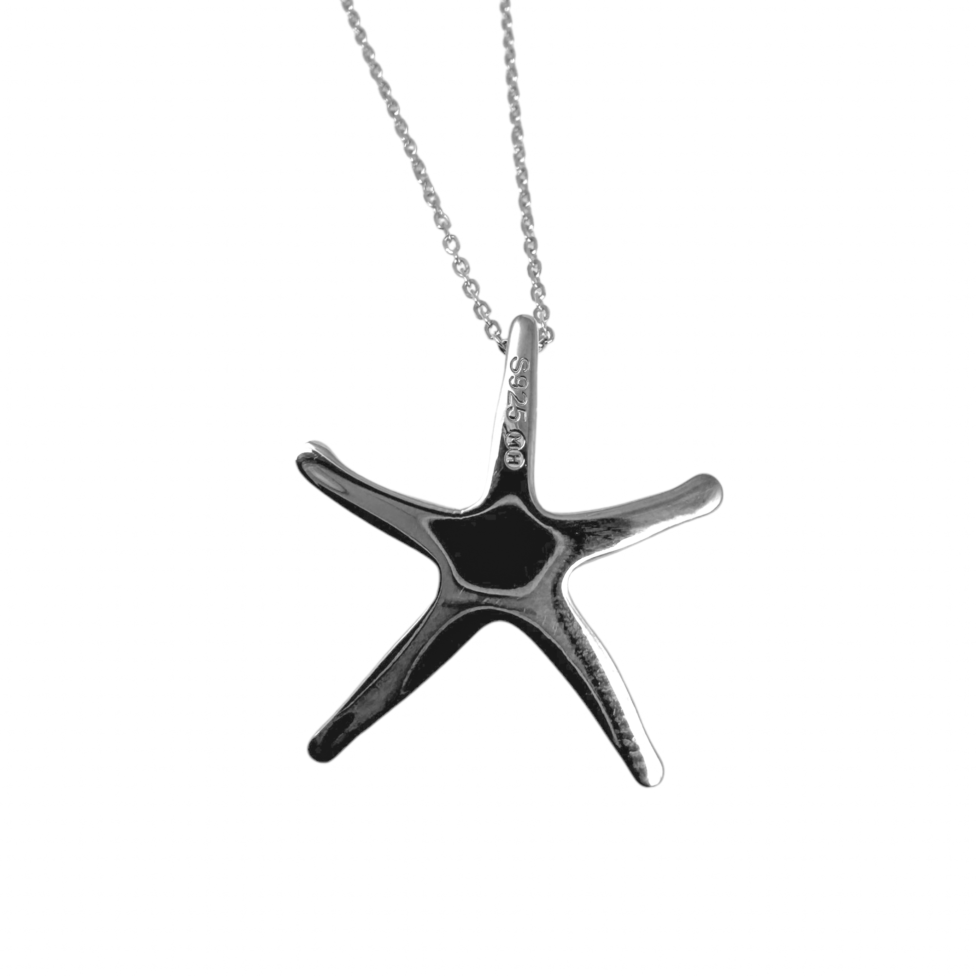 Starfish-shaped pendant smooth reverse side on a chain against a white background