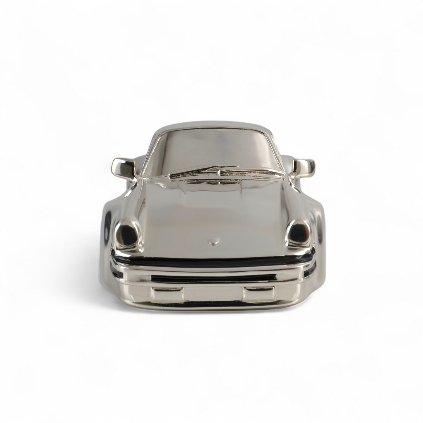 Front view of sterling silver Porsche 911 miniature car showing headlights and sleek automotive design