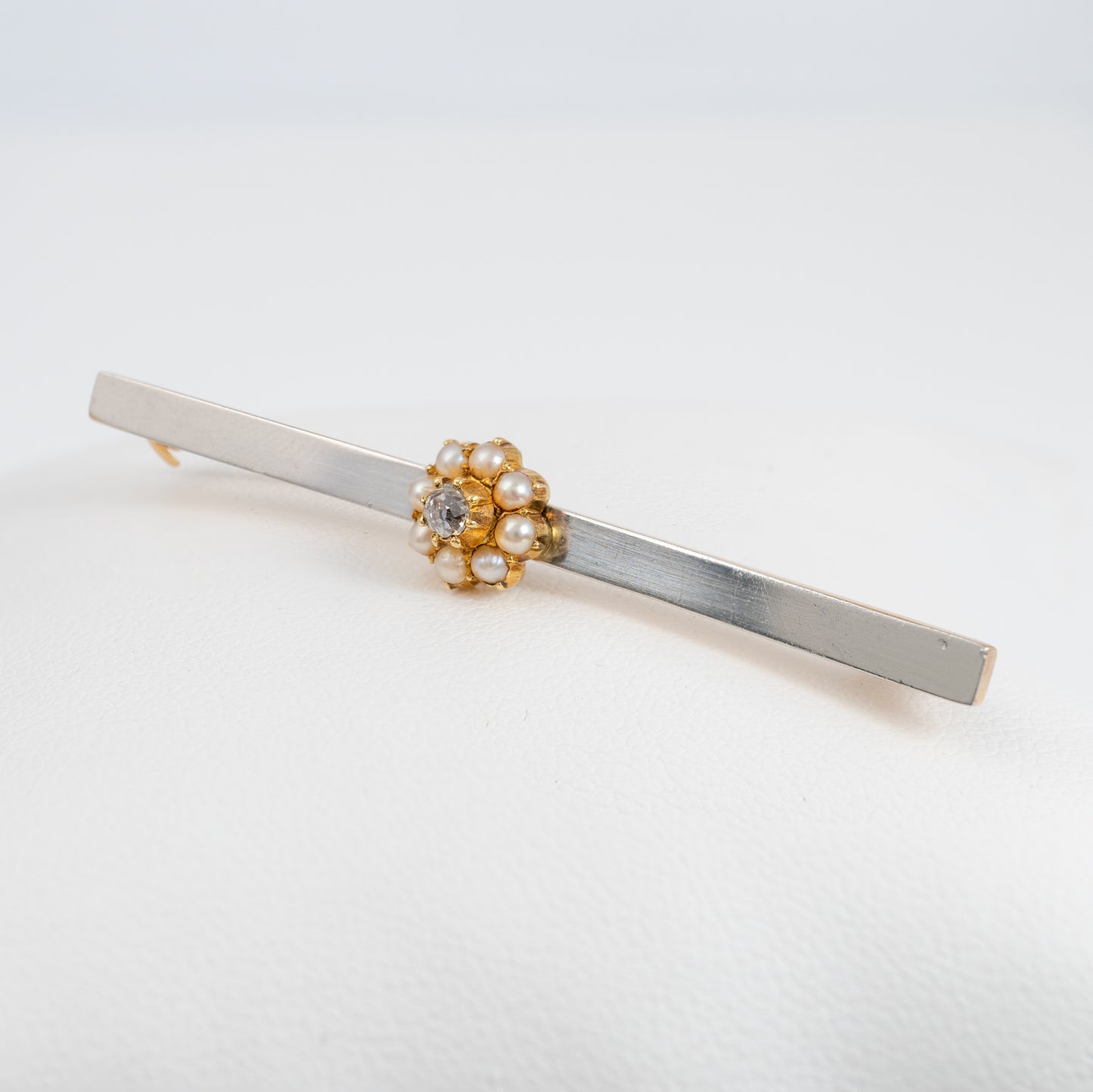 antique diamond pearl brooch showing the platinum front