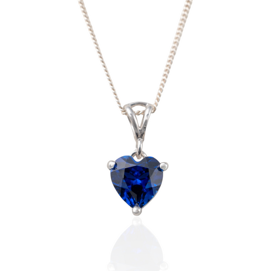 Blue sapphire heart necklace in sterling silver on chain – front view
