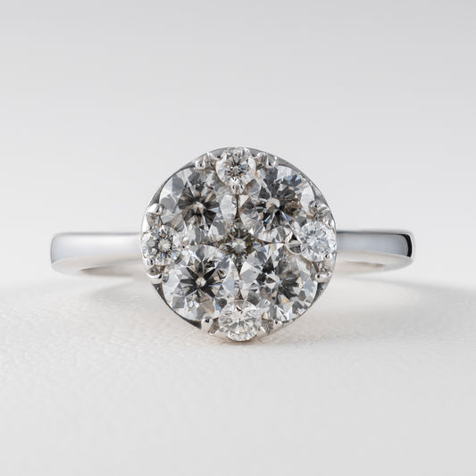 1 carat diamond ring close up cluster setting white gold