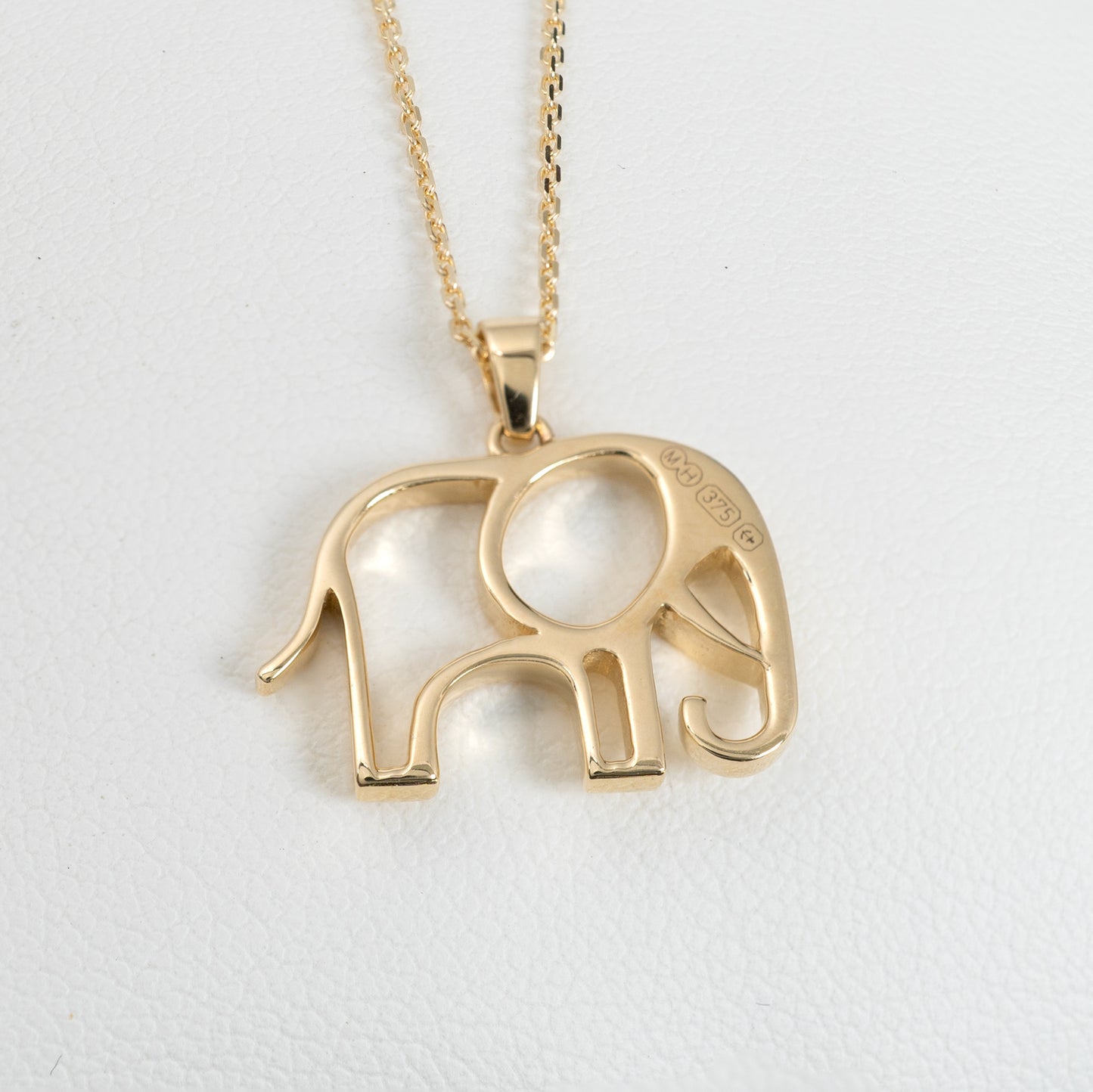 british assay hallmarks on gold pendant hunters fine jewellery