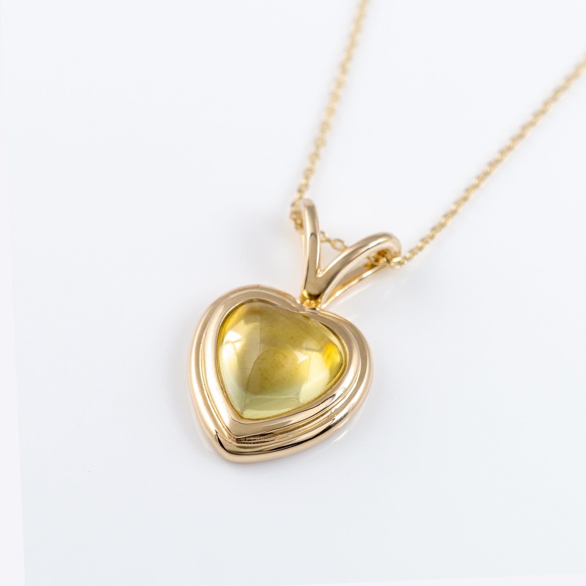 heart pendant necklace lemon quartz cabochon gemstone yellow gold bezel mount