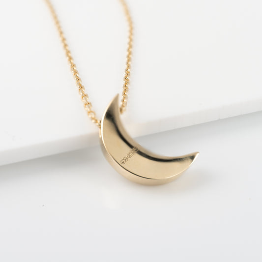 Back of 9ct gold moon crescent necklace showing british assay hallmarks hunters fine jewellery