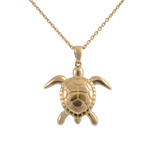 Gold sea turtle necklace pendant in 9ct yellow gold, front view