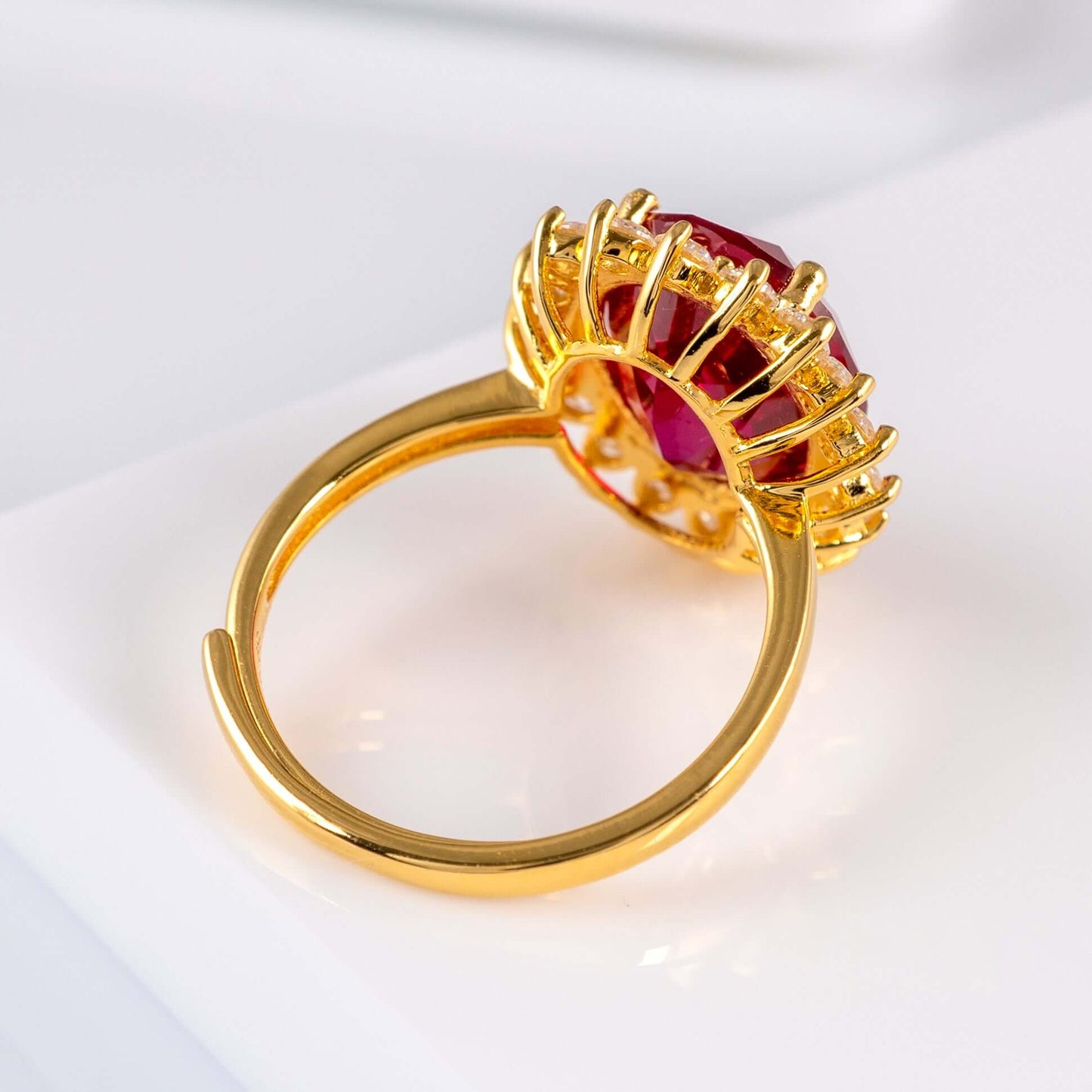 Adjustable ruby ring with open gold vermeil band
