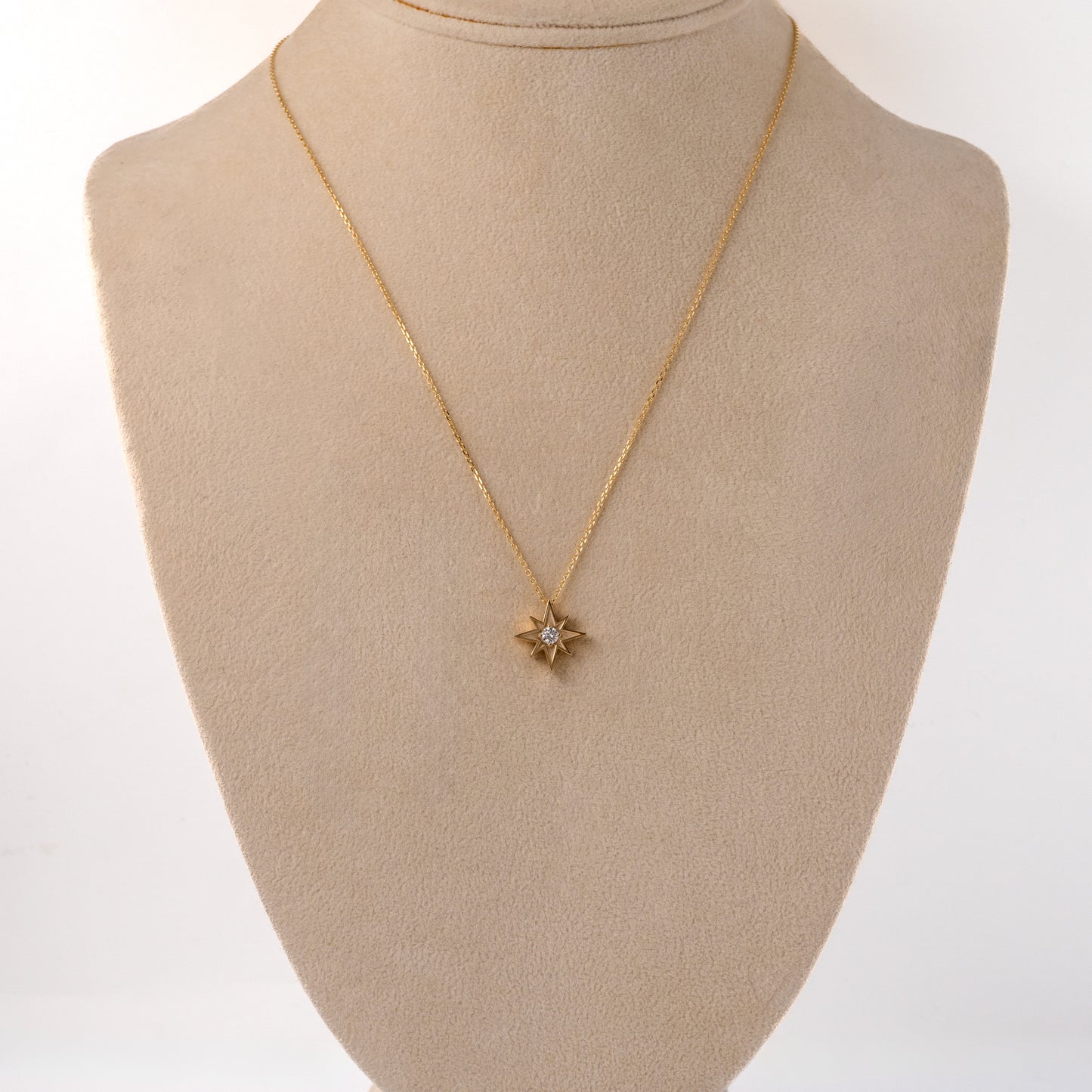 Gold North Star necklace on bust – lab diamond pendant shown to scale – Hunters Fine Jewellery
