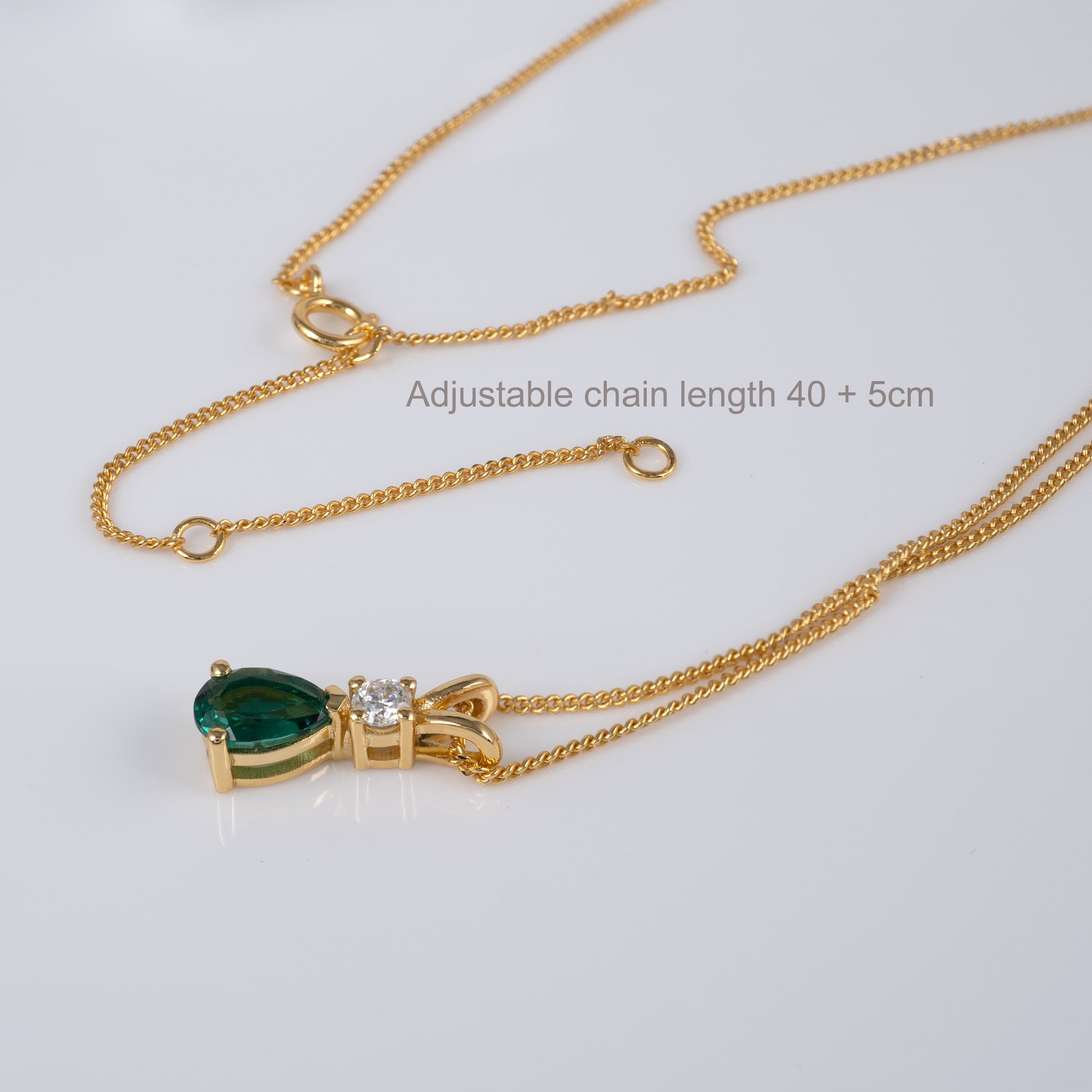 Lab emerald pendant necklace with adjustable 40cm plus 5cm chain shown flat