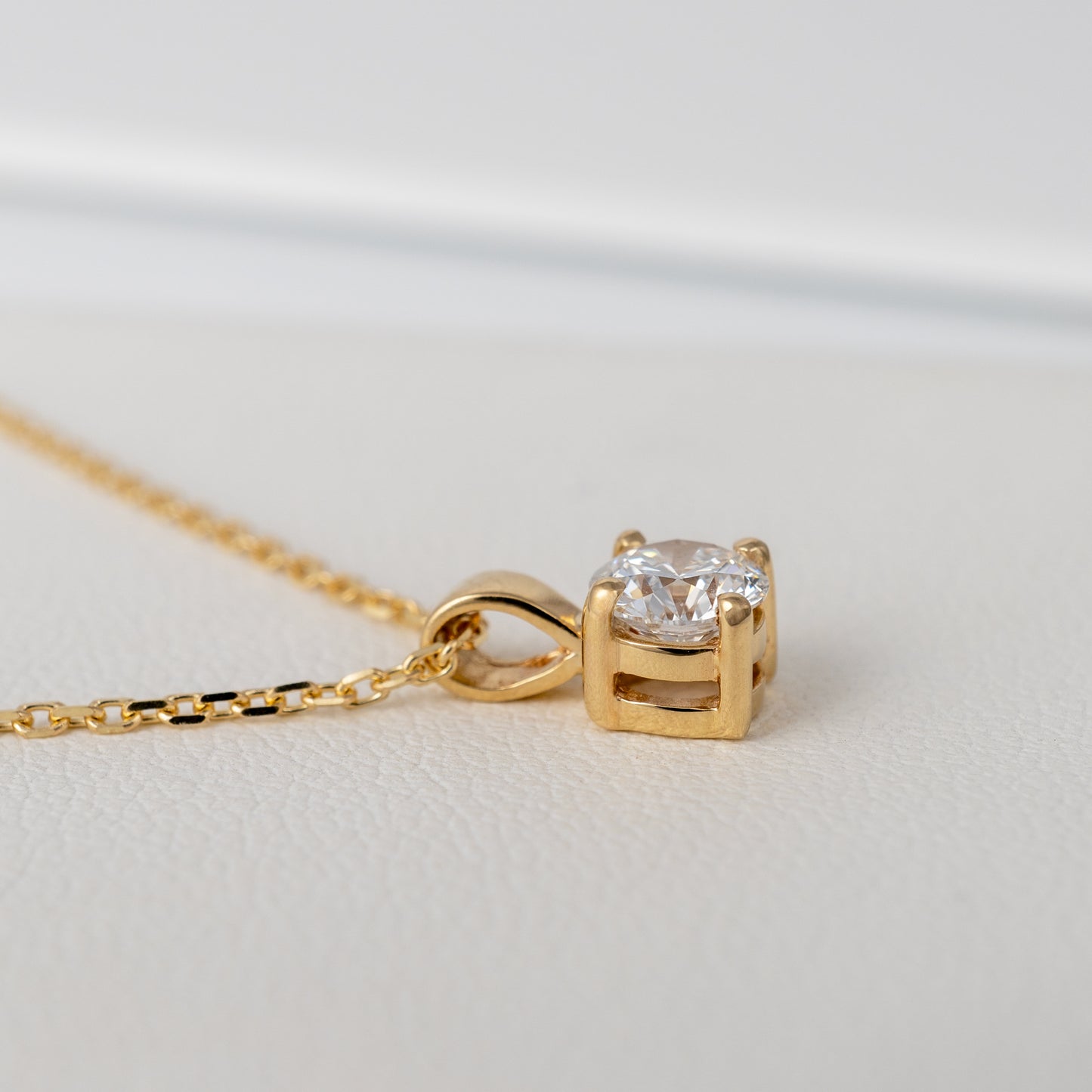 lab diamond pendant side view four prong mount