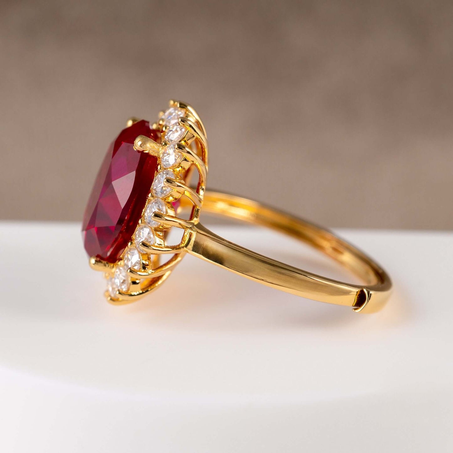 moissanite-halo-ruby-ring-side showing the adjustable shank