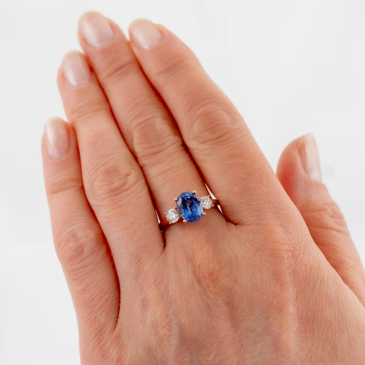 lab sapphire ring on womans hand to show scale