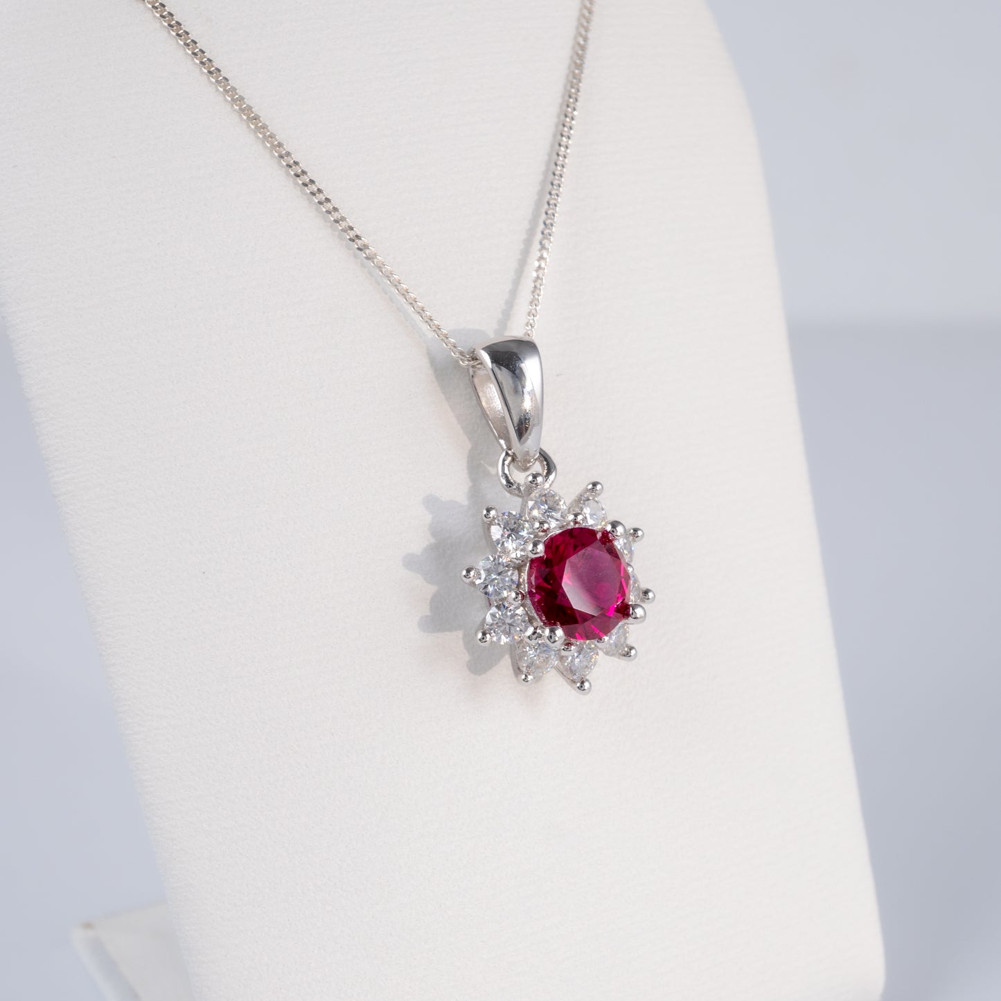 side lab grown ruby pendant with moissanite halo silver chain
