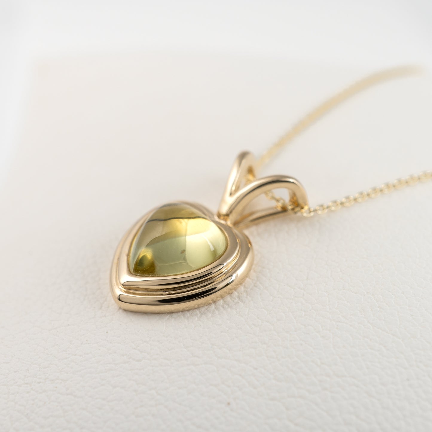 lemon quartz cabochon heart gold pendant side view