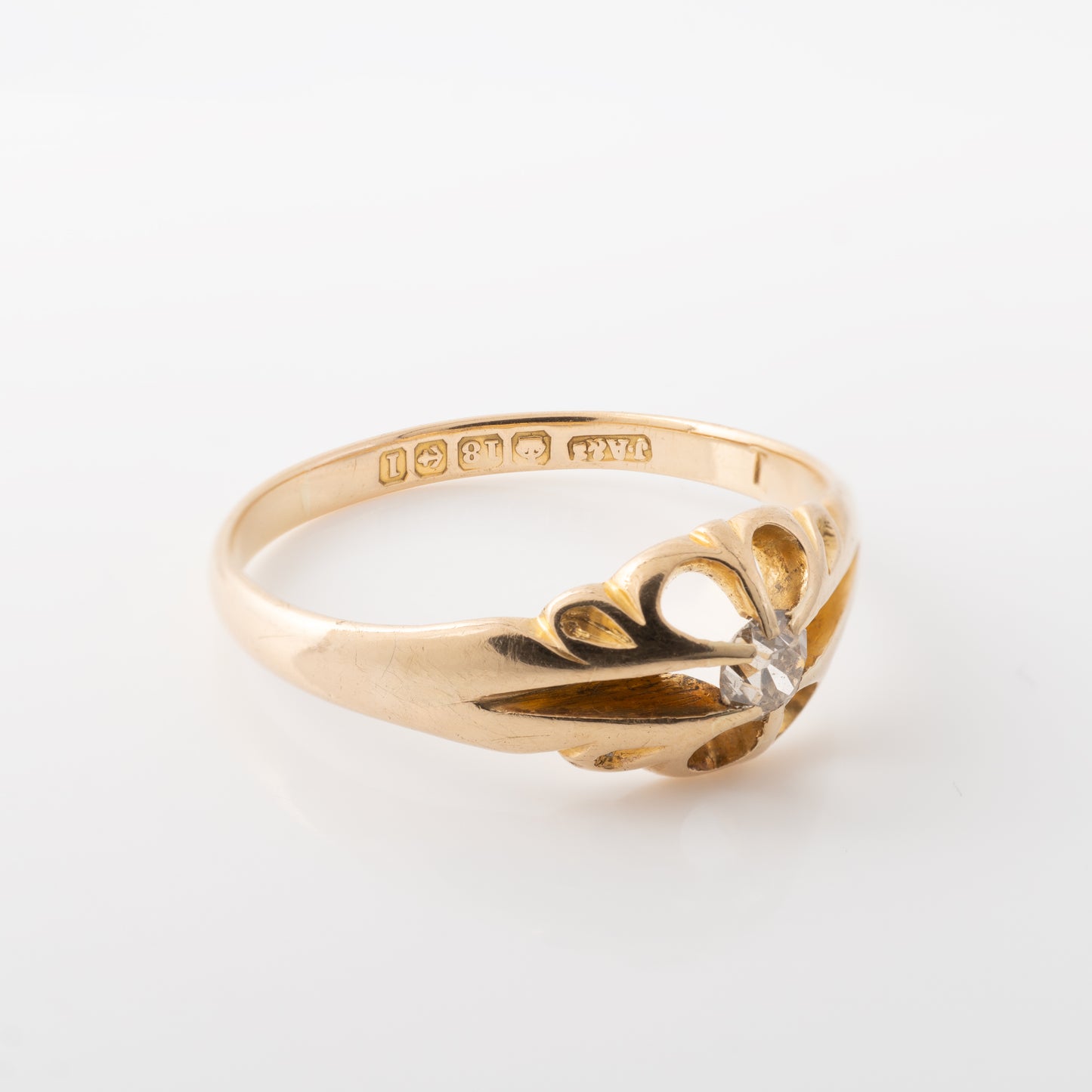 side of Mens vintage diamond solitaire ring in 18ct yellow gold with hallmarks on view