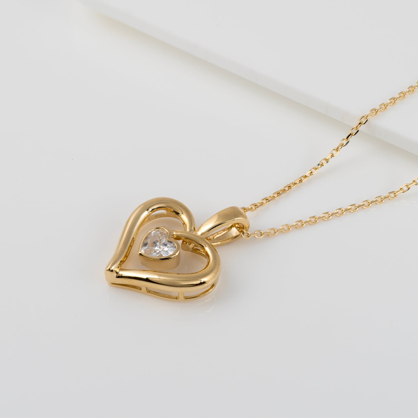 Heart-cut moissanite necklace with adjustable gold chain