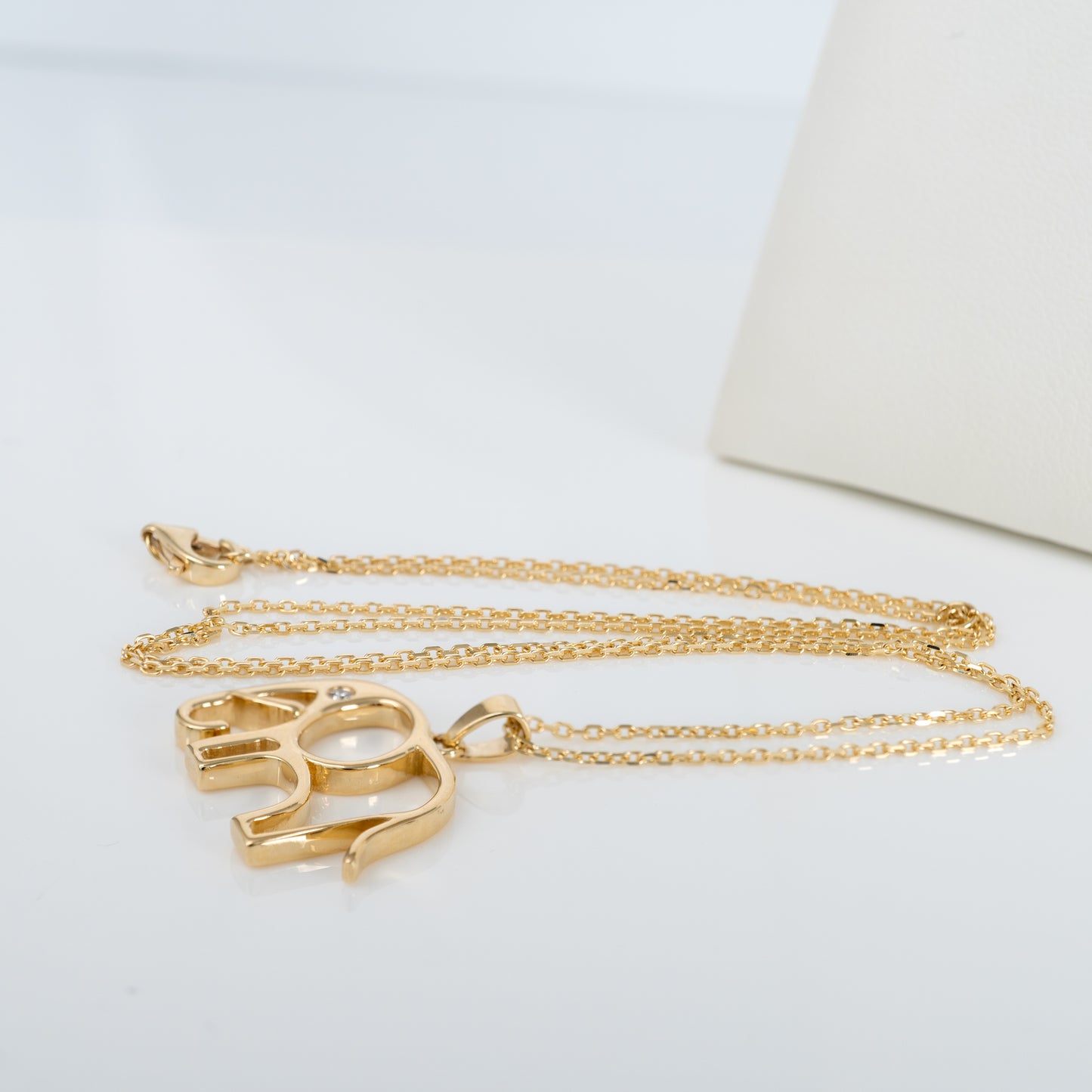 9ct gold elephant pendant with full chain layout