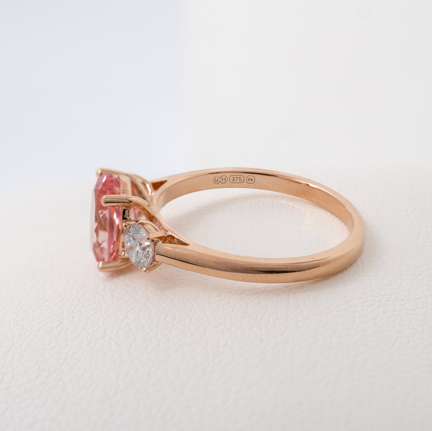 Lab created padparadscha sapphire ring with British hallmarking on rose gold shank – Hunters Fine Jewellery
