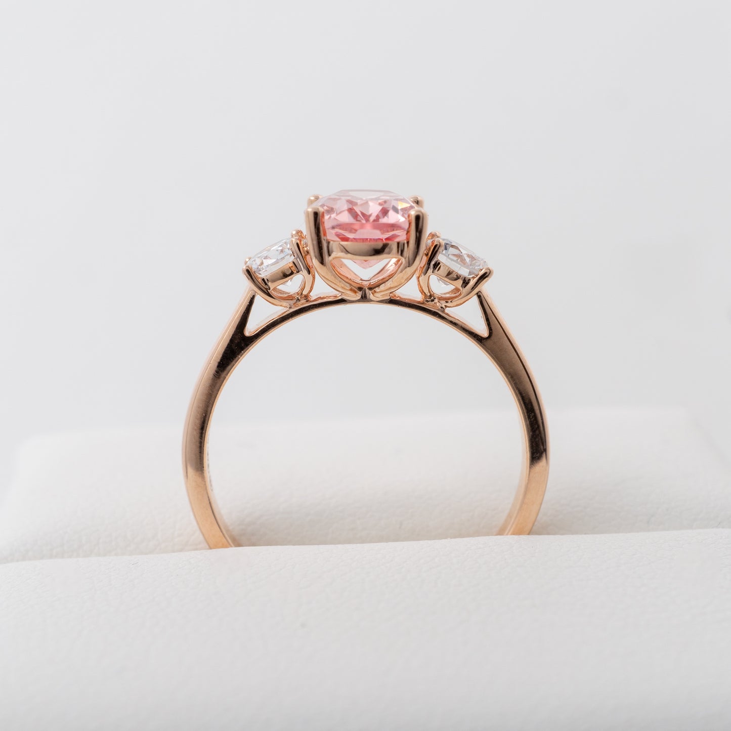 Side view of lab created padparadscha sapphire ring with lab diamonds in rose gold – Hunters Fine Jewellery