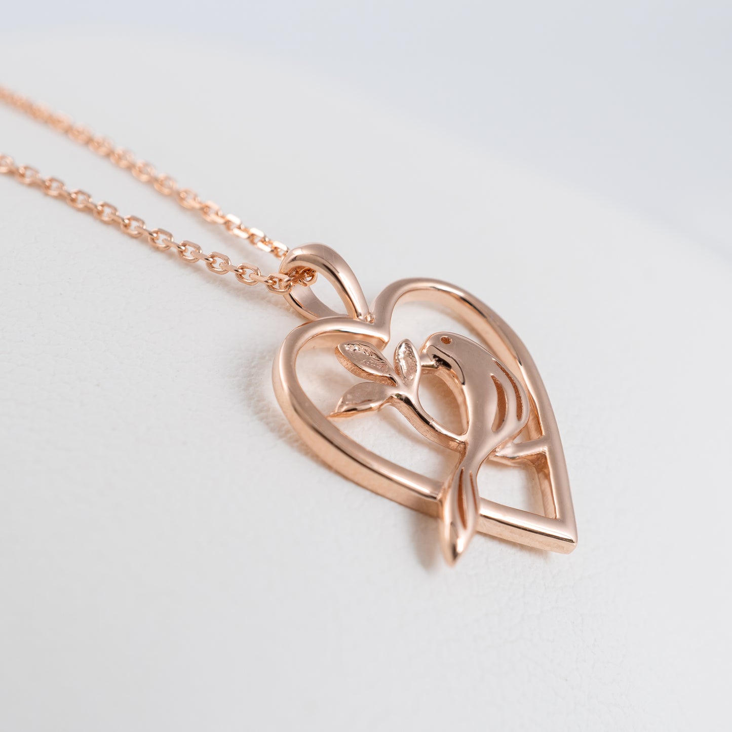 rose gold bird heart necklace pendant side view