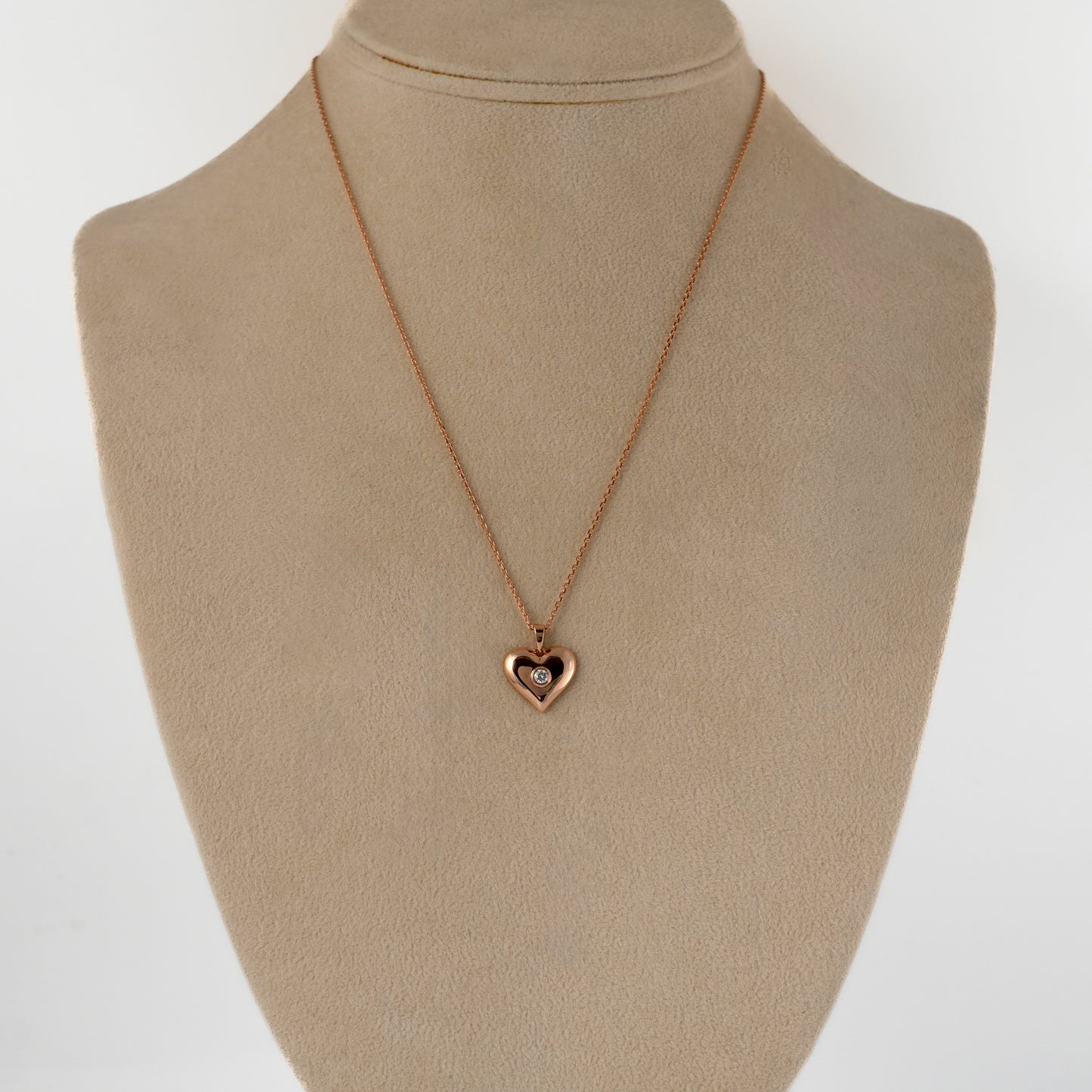 Rose gold heart necklace with lab-grown diamond displayed on jewellery bust - Hunters Fine Jewellery