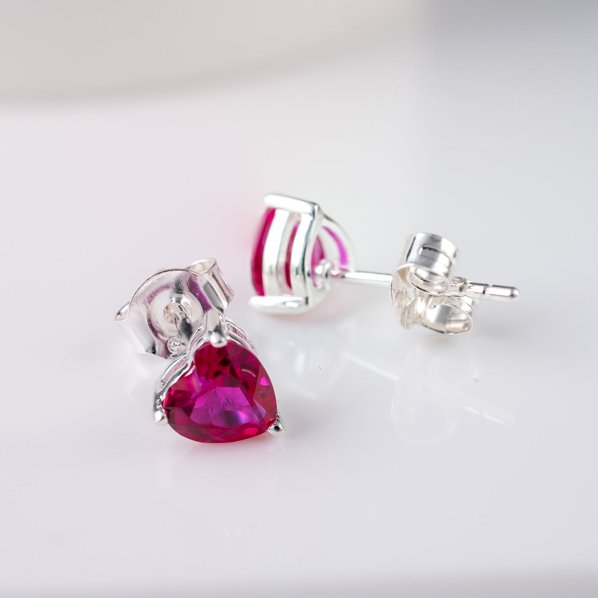 lab ruby-heart-earrings-scroll-butterfly backs