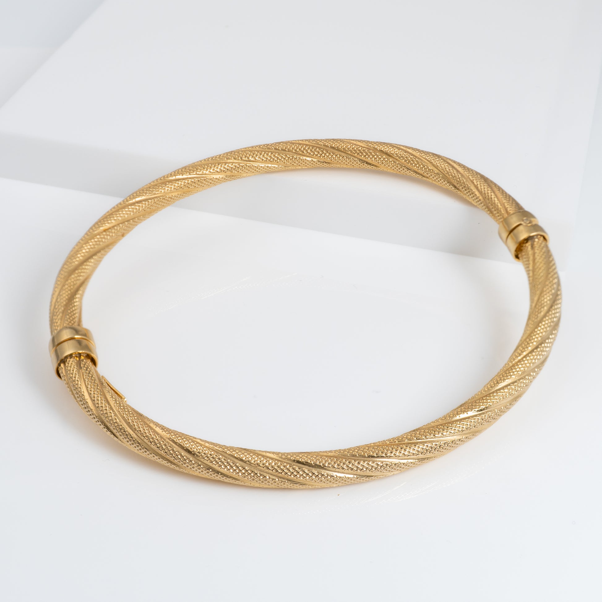 gold bangle bracelet with spring lock
