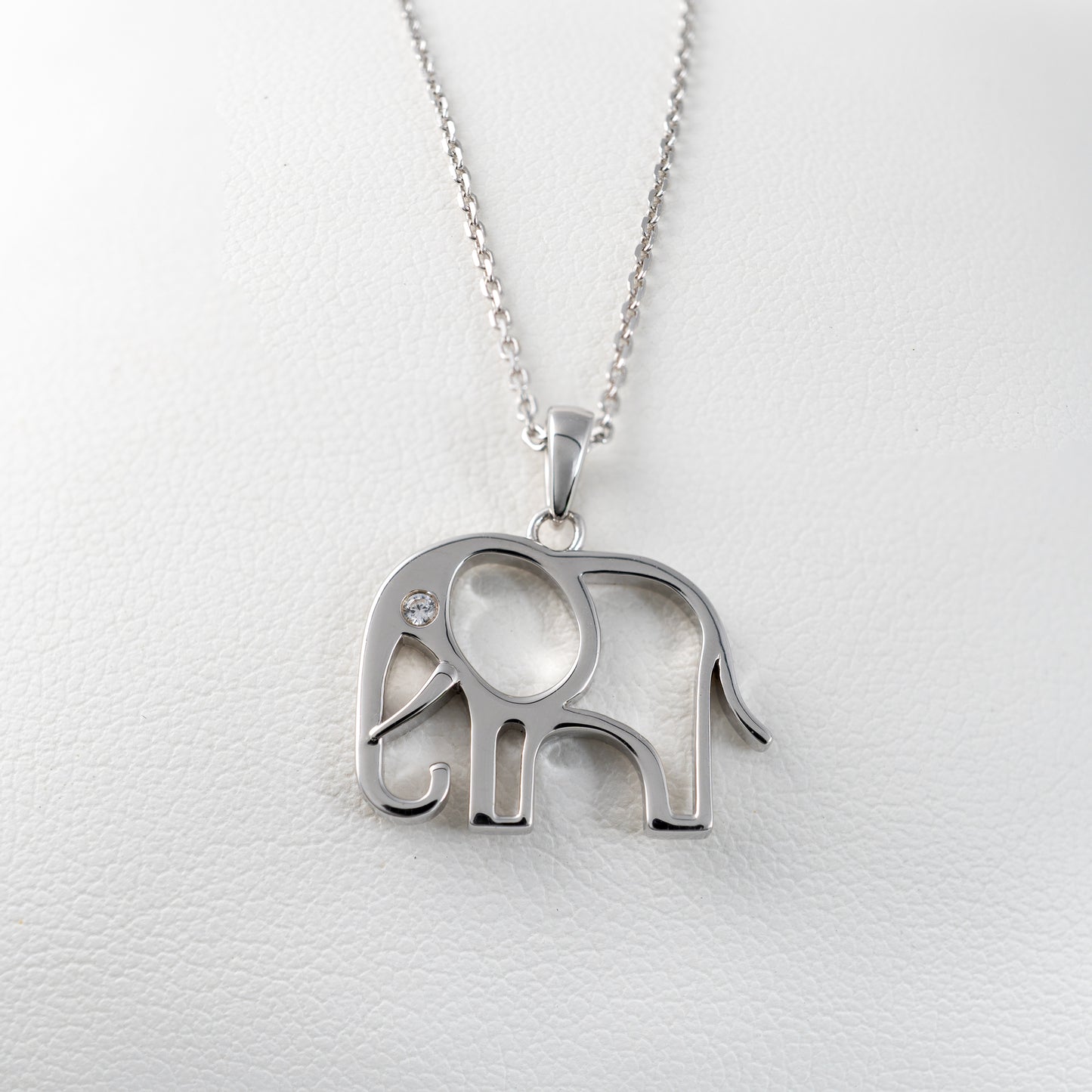 Contemporary silver elephant pendant necklace with round cubic zirconia
