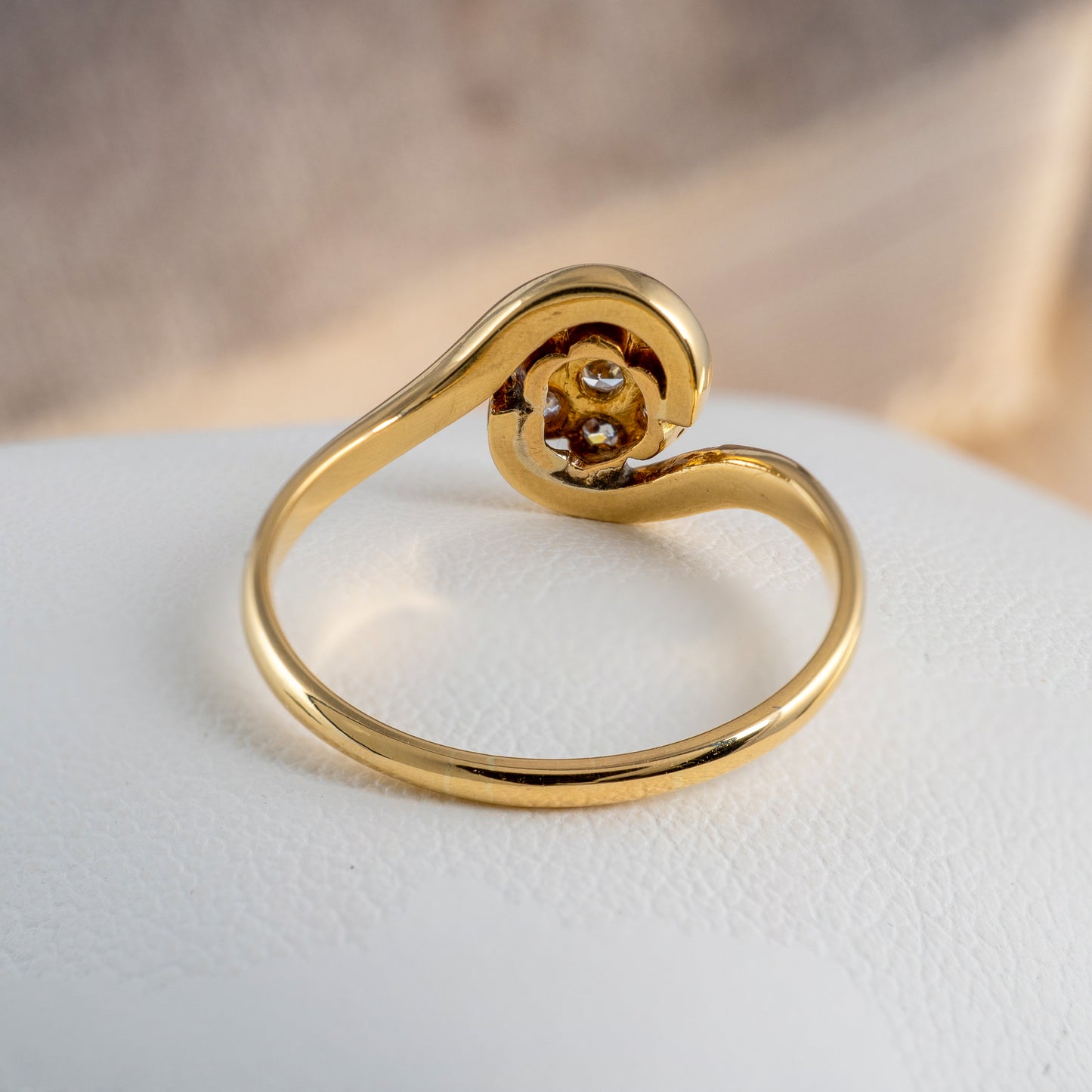 Back view of vintage diamond flower ring in 18ct yellow gold with platinum setting
