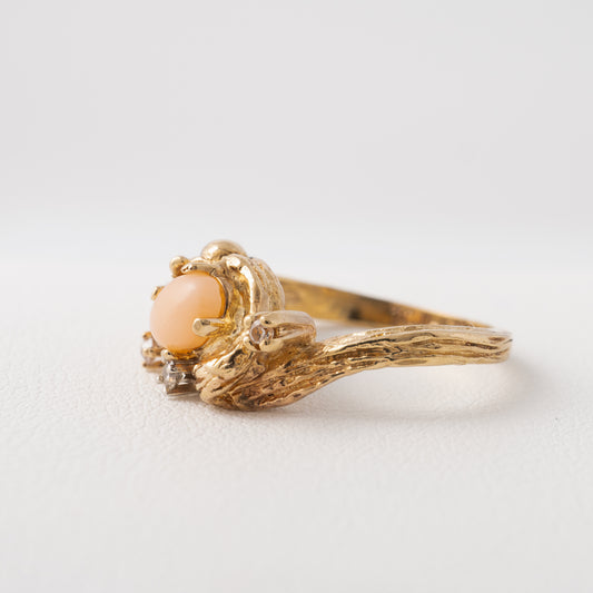 Side view of vintage coral ring showcasing the organic tree bark texture and petite 10k gold band