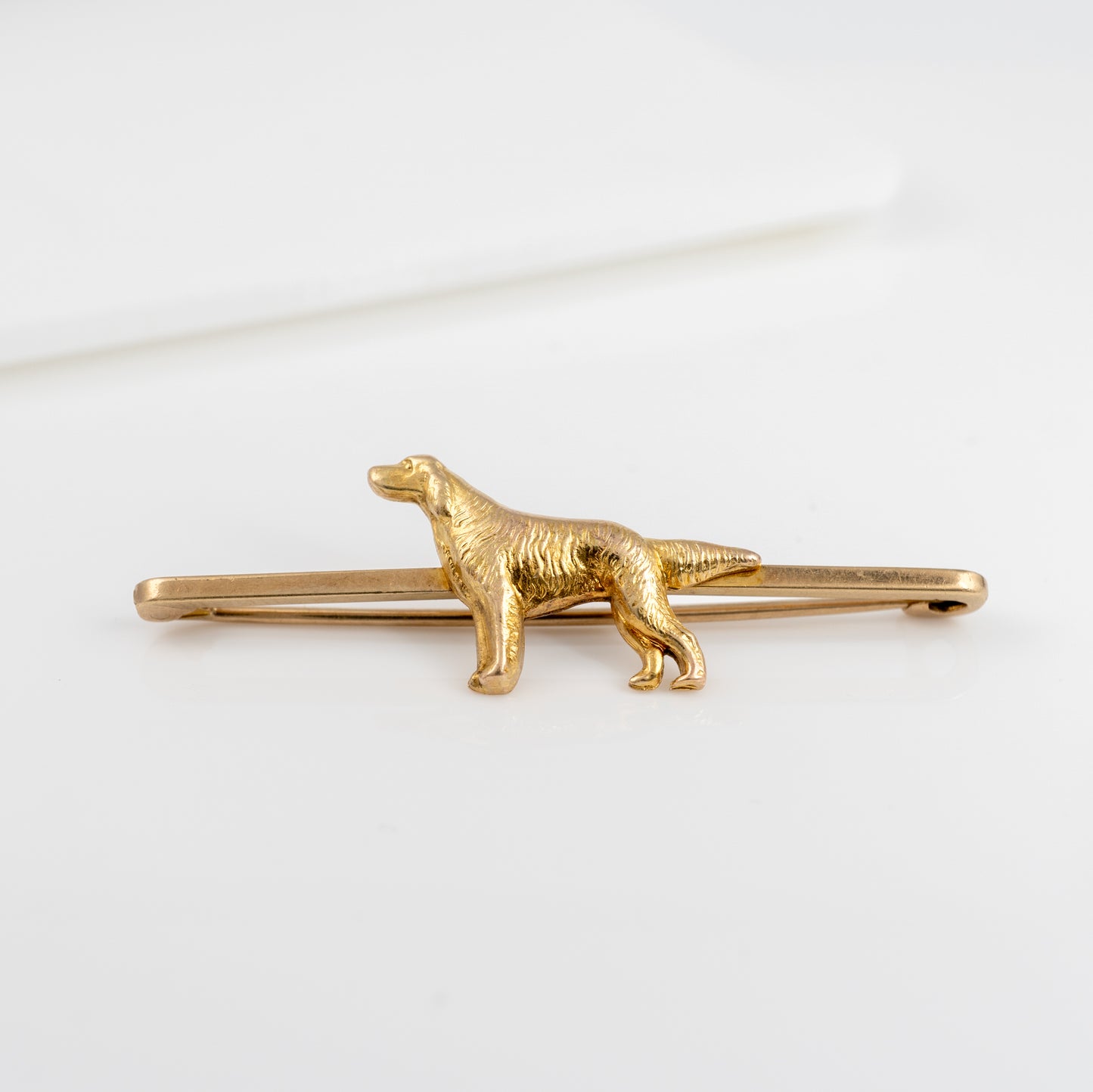 yellow gold dog brooch