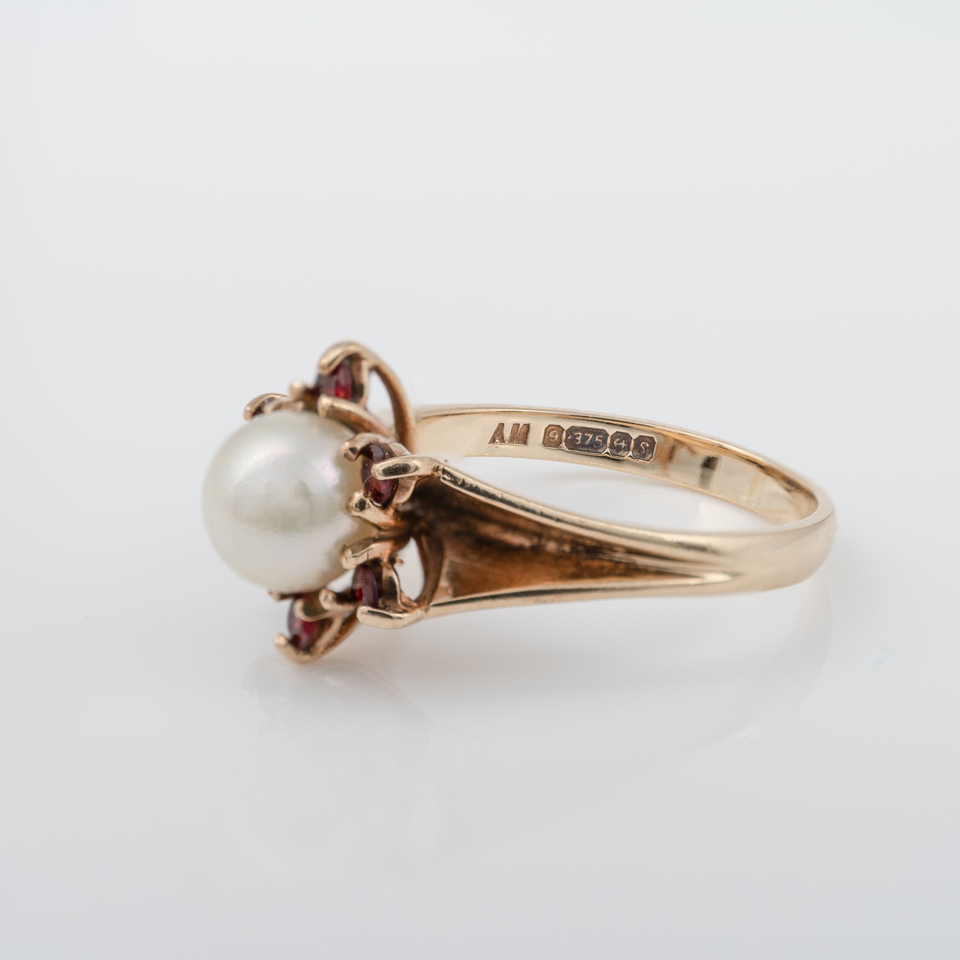 vintage garnet and pearl ring with 1960s vintage assay hallmarks