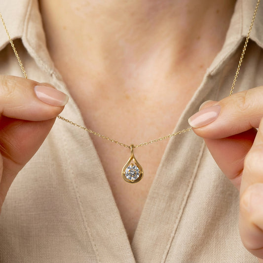 woman wearing 375 gold lab diamond infinity necklace